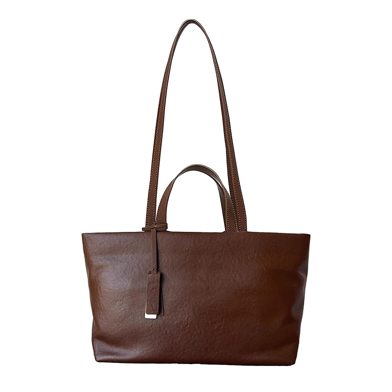 Women's large vegan leather tote bag for travel